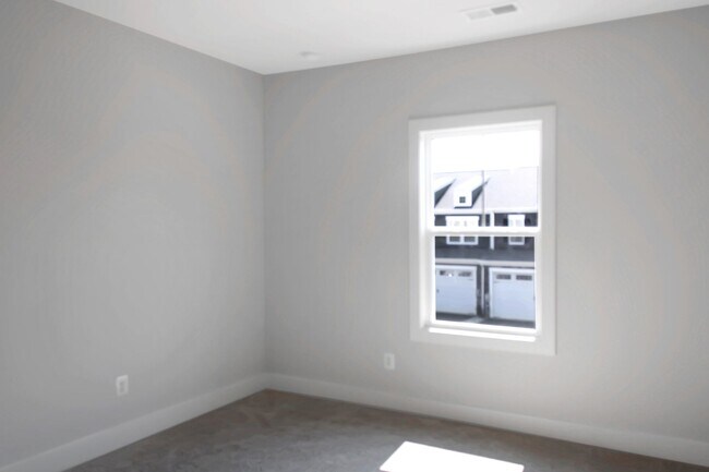 Building Photo - End-unit villa with first-floor primary