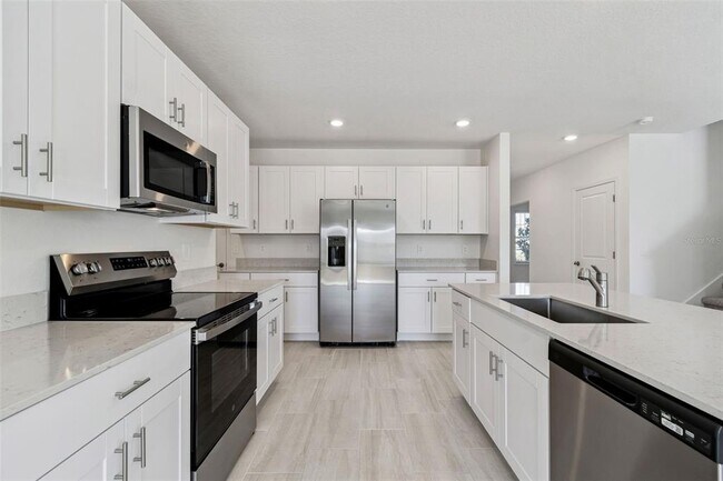 Building Photo - 1712 Tropical Oasis Ave