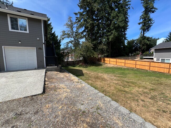 Building Photo - Elevated 3-Bedroom Home with Secure Garage & Cozy Living Space