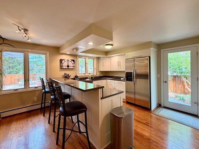 Building Photo - Fully Furnished Rockmont Heights Home with Sunroom, Multiple Fireplaces & Private Yard
