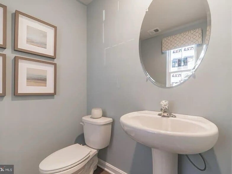 Powder room on main level - 377 Aylesbury Ln