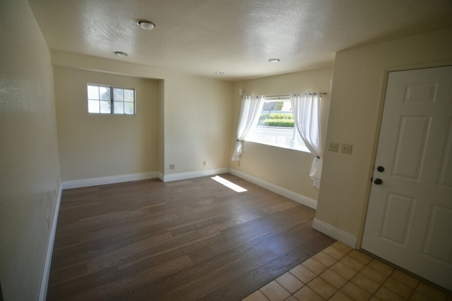 Living Room - Spacious for a couch, loveseat, TV - 111 N Pacific Coast Hwy