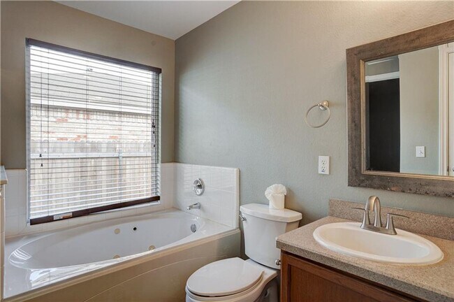 Building Photo - Charming One-Level 4 Bedroom Home with 2-C...