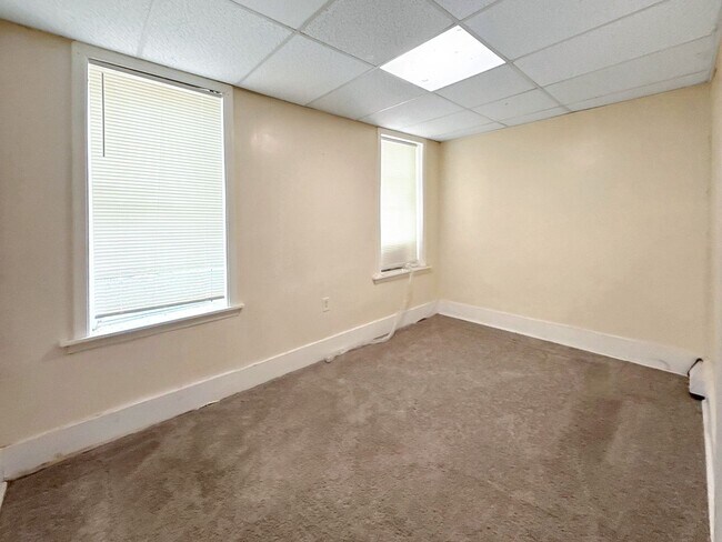 Building Photo - Charming Baltimore Rowhome with Updated Kitchen, Covered Front Porch & Basement