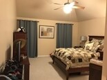 Spacious master bedroom with cathedral ceilings, walk-in closet and master bath - 1809 Stark Drive