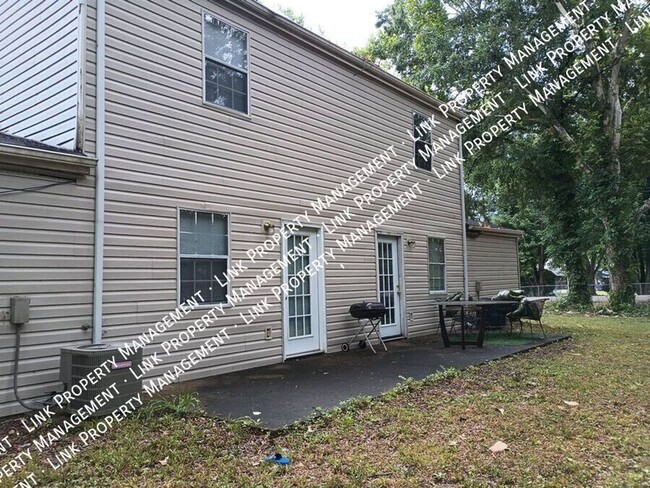 Building Photo - COMING in February, this 2 bedroom Townhom...