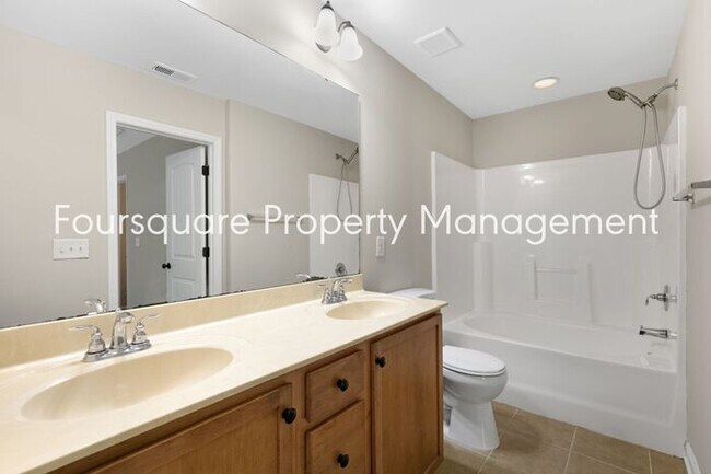 Building Photo - Cozy Townhome with Fireplace, Private Back Patio,  Near US-1, I-540 & Shopping
