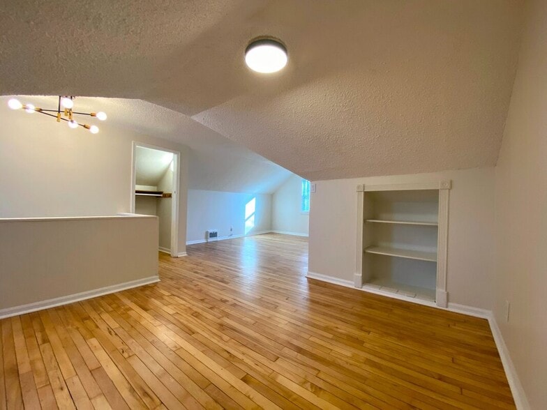 Primary Suite - Built-in shelving and two walk-in closets for ample storage - 710 Sheridan Avenue North