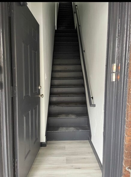 Interior stairwell from front door to 3rd floor unit door. - 3761 N 18th St