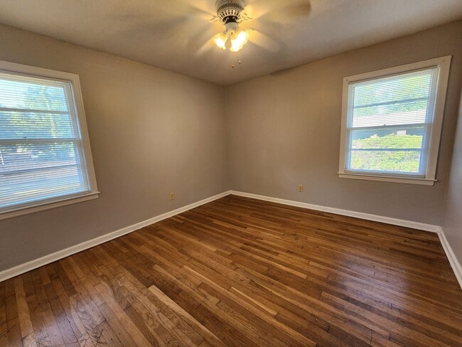 Building Photo - Spacious 4BR/2BA Brick Home with Fireplace, Large Island!