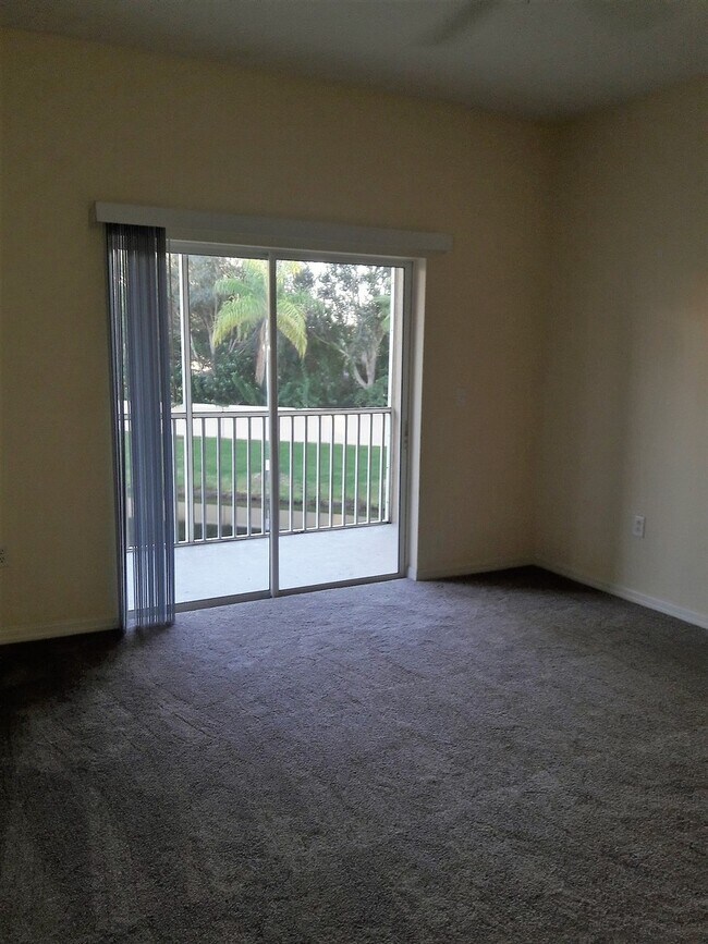 Building Photo - Annual unfurnished-3 bedroom, 2 bath condo with garage in gated community!
