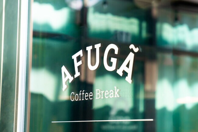 Building Photo - Stylish Furnished Loft Steps from Downtown