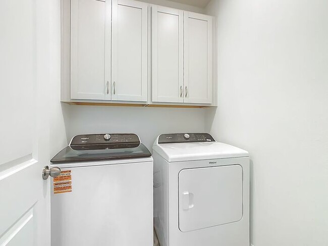 Building Photo - New Luxury Townhome in Celebration with All porcelain tiled floors. Island Village new construction