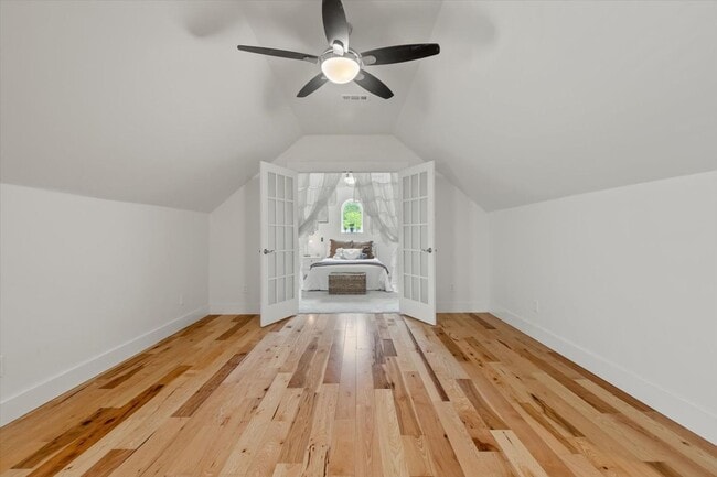 Building Photo - unning custom-built home on a full acre in...