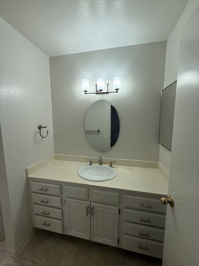 Building Photo - Spacious 3-Bedroom, 2-Bath Multi-Level Home with Balcony, In-Unit Laundry & Dual Parking