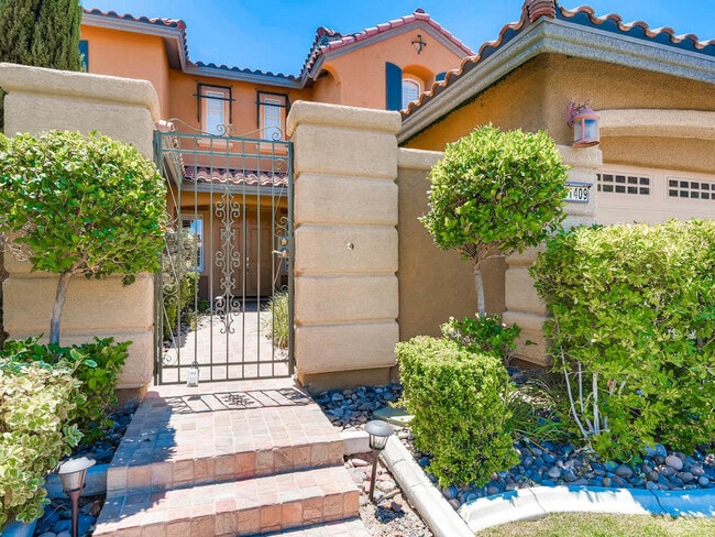 Building Photo - LUXURIOUS UPGRADED HOME IN A GATED SUMMERLIN AREA!!HOUSE HAS POOL AND SPA AND PATIO COVERED BACKY...