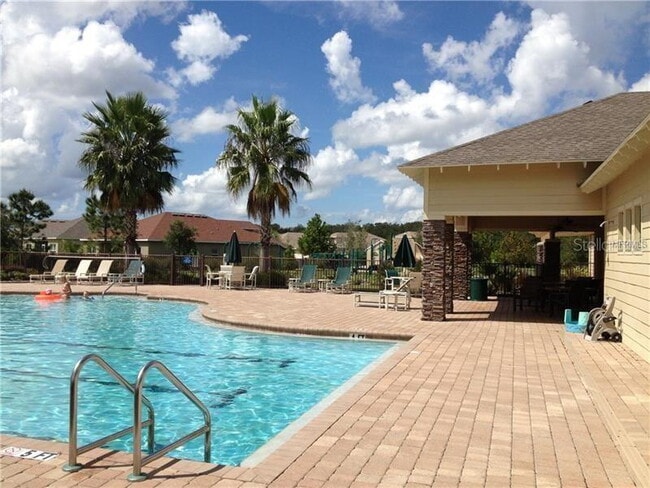 Building Photo - Gated Community! Gorgeous ammenity center