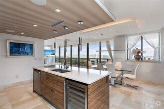 Building Photo - 5875 Collins Ave