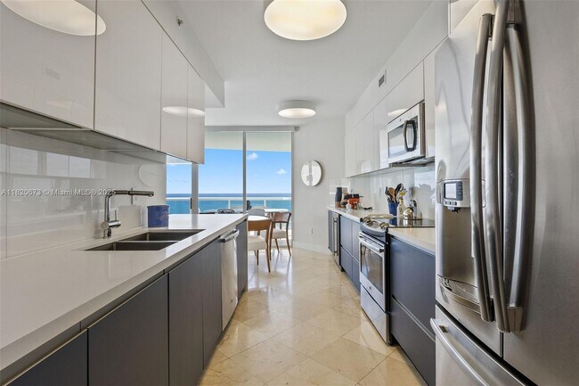 Building Photo - 18671 Collins Ave