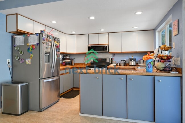 Building Photo - Charming 3-bedroom, 2.5 baths | Family-Friendly Bellevue Crossroads Neighborhood