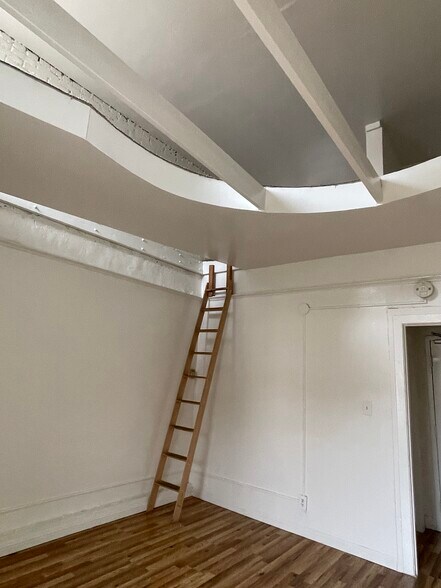 main room looking up at loft - 4013 W Sunset Blvd