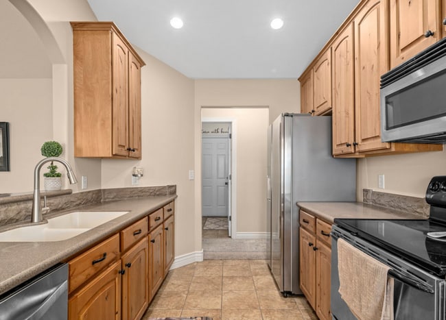 Building Photo - Spacious 5-Bedroom Home with Theater Room & Prime Location