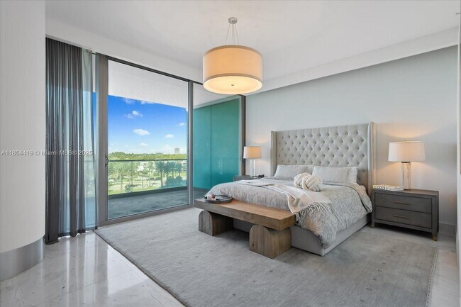 Building Photo - 10201 Collins Ave