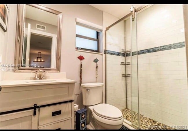 Building Photo - 3833 Cocoplum Cir