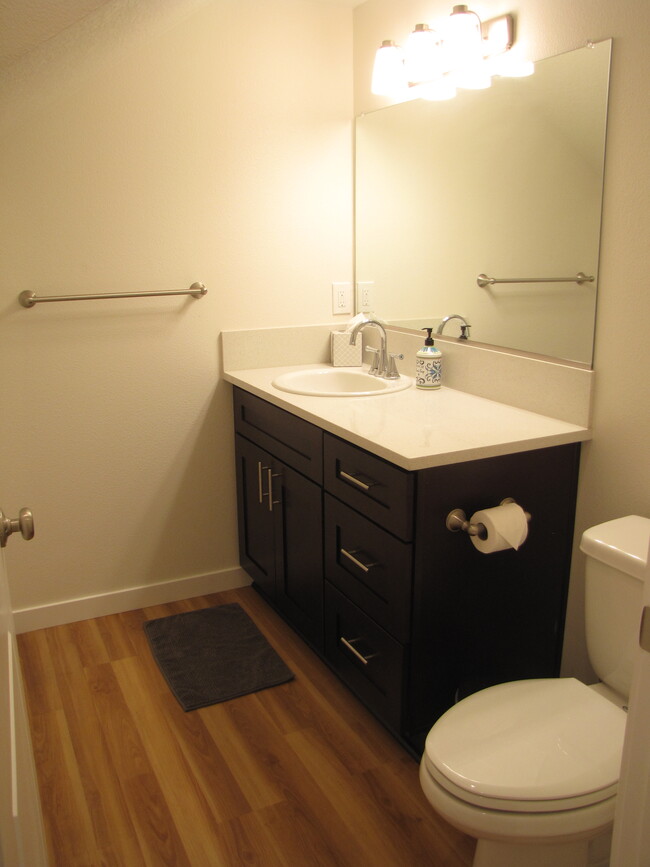 bathroom with a tall standup shower with a extra deep closet - 8814 N Edison St