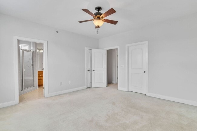Building Photo - Spacious End Unit with Garage in Gated Com...