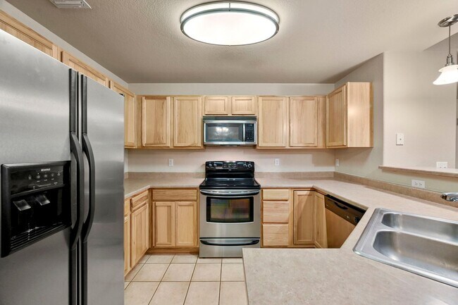 Building Photo - Spacious Top-Floor Condo in Las Casas at Broadmoor Bluffs | 2 Bed / 2 Bath + Garage, Very close t...