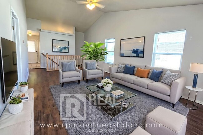 Building Photo - Spacious & Updated 2 Bedroom, 2 Bathroom Twin Home in Ammon with Garage, Fenced Backyard, and Hoo...