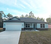 Building Photo - Brand New & Beautiful 3/2/2 in Citrus Spri...