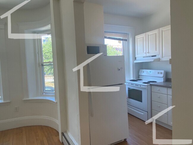 Building Photo - Ridiculous renovation in the living room including 'metal object'