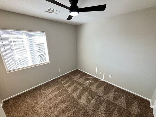 Building Photo - Spacious Tri-Level 4-Bedroom Home with Bal...