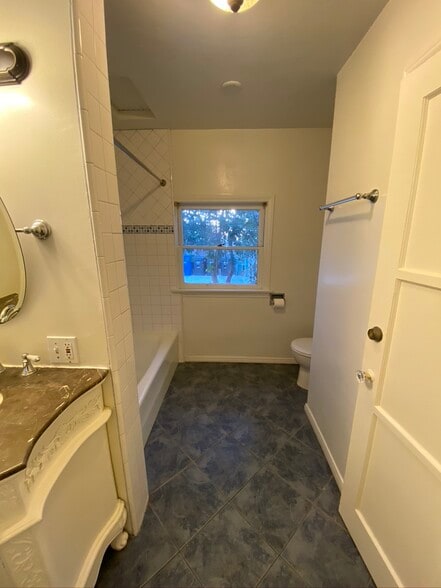 Bathroom has full closet and storage - 1236 10th St