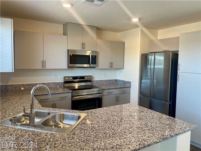 Building Photo - Brand New 4 Bedroom Townhome-Sunrise Manor