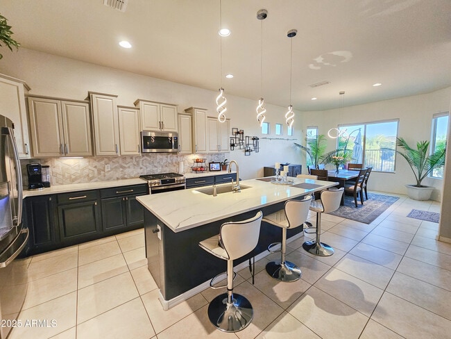 Building Photo - 5947 E Sienna Bouquet Pl