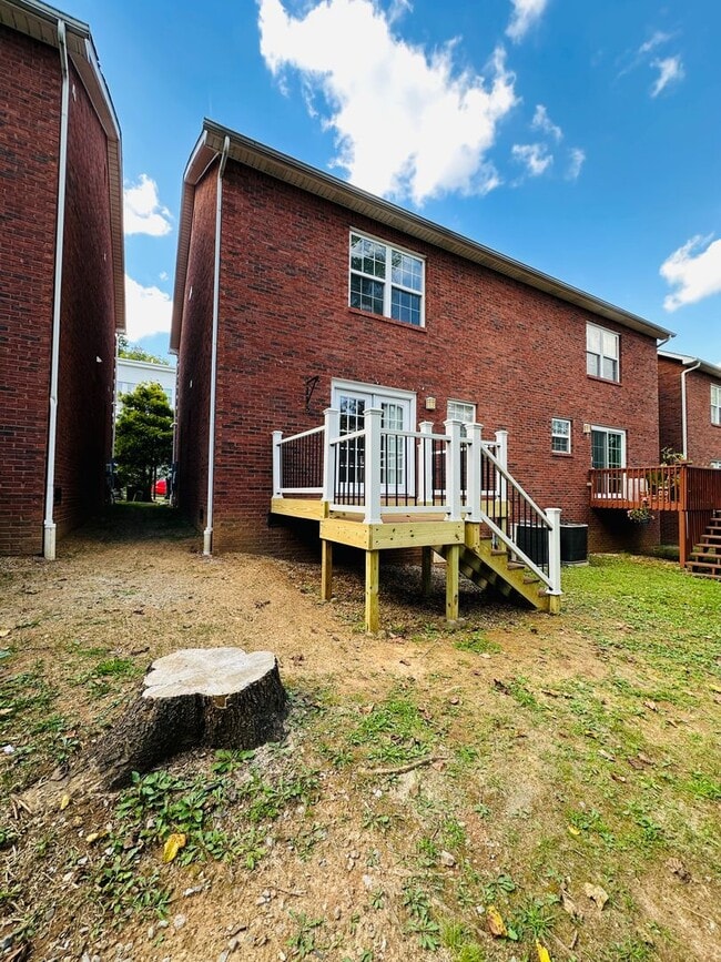 Building Photo - 2 bed, 2.5 bath updated townhouse w/ 1-car garage & Trex deck available now