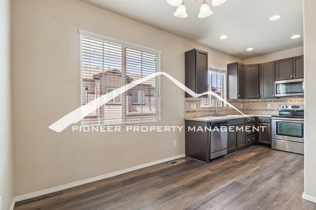 Building Photo - Low-Maintenance Living with Mountain Views! 3BR Townhome, 2-Car Garage & A/C
