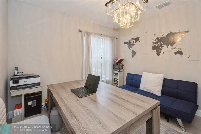 Building Photo - 4485 Carambola Cir N
