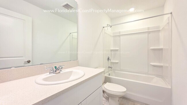 Building Photo - OUTSTANDING BRAND NEW TOWNHOME MOVE IN READY! AZARIO TOWNHOMES LWR !