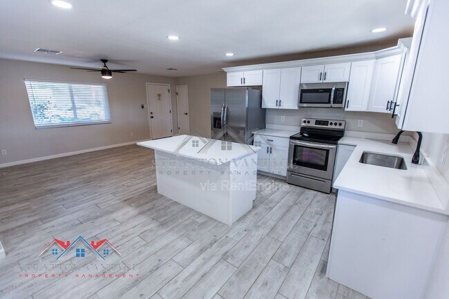 Building Photo - 6415 E Aspen Ave