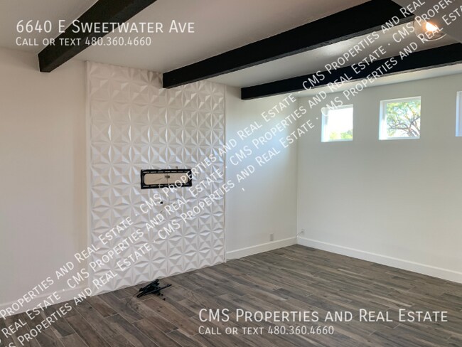 Building Photo - 6640 E Sweetwater Ave
