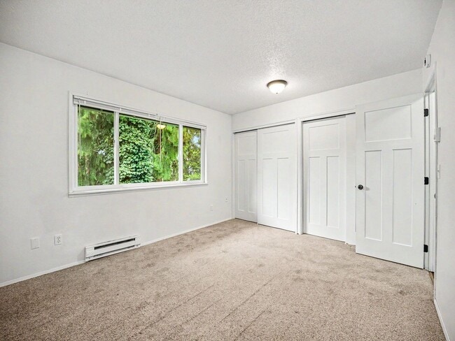 Building Photo - Spacious 2-Story Condo in a Quiet, Well-Located Community!
