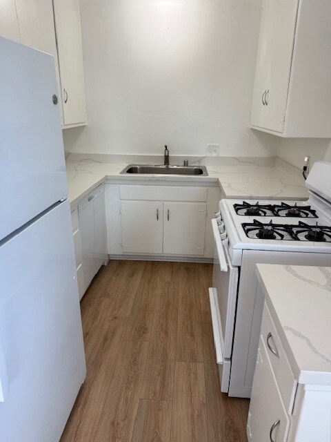 Building Photo - 8428 Gulana Ave