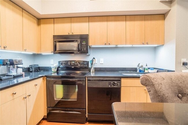 Building Photo - "Stylish 1-Bedroom Apartment with Modern A...