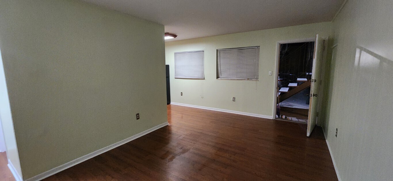 View of the entrance door & two large windows from the living room - 501 NW 15th Ave