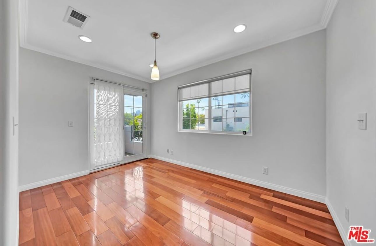 Shared dining area. This balcony will be yours, with access from your bedroom as well. - 3242 Hutchison Ave