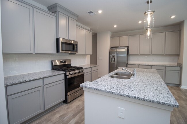 Building Photo - Spacious 4-Bedroom Home - Convenient to Fo...